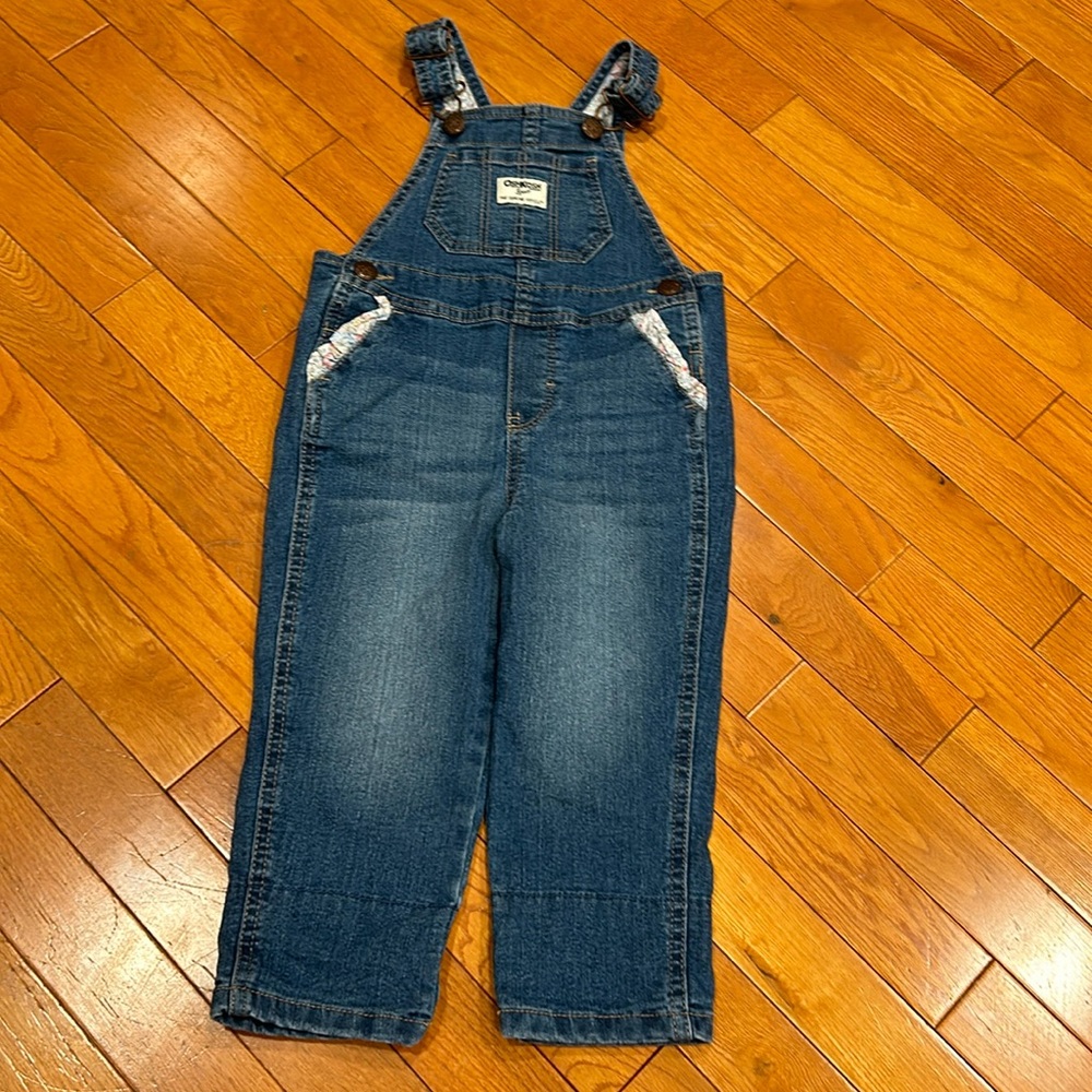 NWOT- Oshkosh toddler girl Jean overalls with floral print on pockets